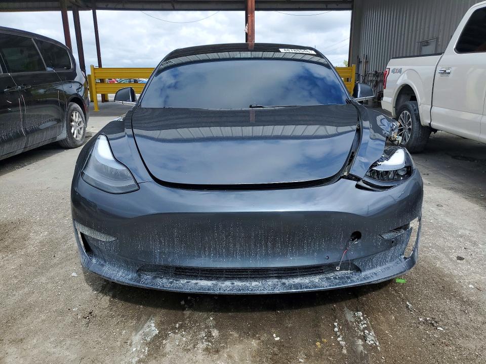 2020 Tesla Model 3 VIN 5YJ3E1EC7LF733742 COPART salvage auction — SIDE, FL, sold $5,000 on 2026-08-28 (photo 5)