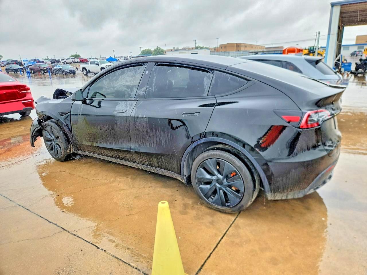 2025 Tesla Model Y VIN 7SAYGDEE9SA344604 COPART salvage auction — Front End, TX - SALVAGE VEHICLE TITLE, sold $9,900 on 2026-07-09 (photo 2)