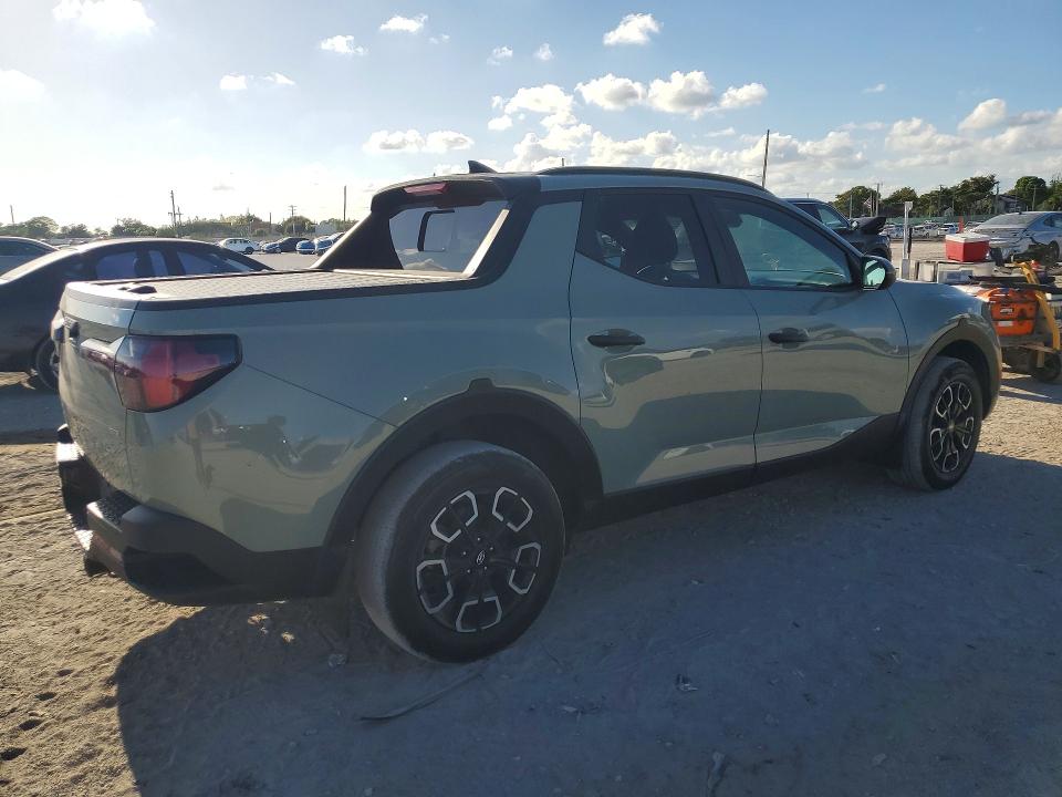 2023 Hyundai Santa cruz VIN 5NTJCDAE8PH040676 COPART salvage auction — SIDE, Fl - Cert Of Title Slvg Rebuildable, sold $9,200 on 2026-07-09 (photo 3)