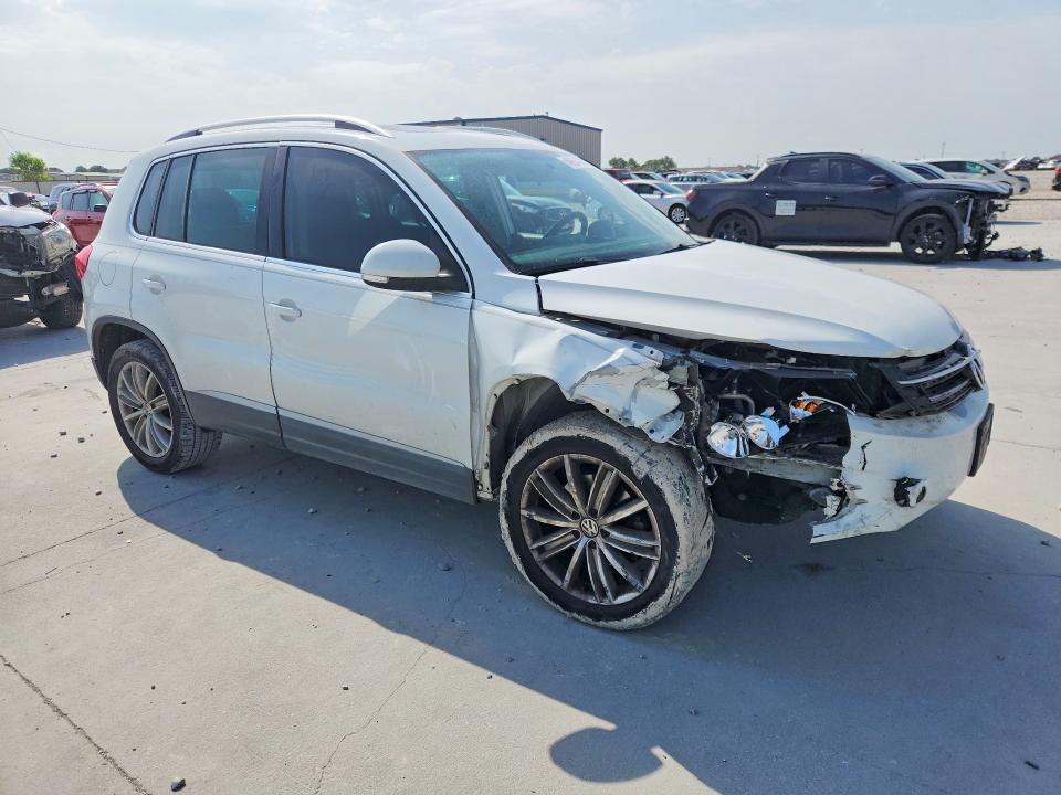 2015 Volkswagen Tiguan VIN WVGAV7AXXFW507709 COPART salvage auction — FRONT END, Tx - Salvage Vehicle Title, sold $150 on 2026-07-28 (photo 4)