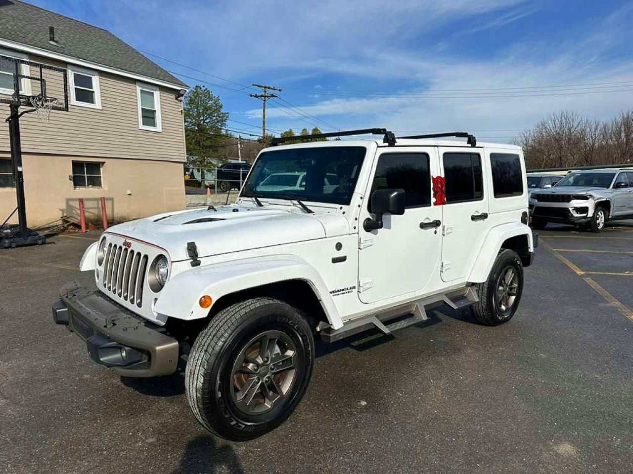 2017 Jeep Wrangler Unlimited VIN 1C4BJWEG9HL537281 COPART salvage auction — Minor Dent/Scratches, NC - CERTIFICATE OF TITLE, sold $9,700 on 2026-07-01 (photo 1)