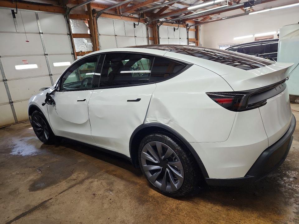 2026 Tesla Model y VIN 7SAYGDEEXTF581624 COPART salvage auction — FRONT END, IL - SALVAGE CERTIFICATE, sold $20,500 on 2026-07-06 (photo 2)