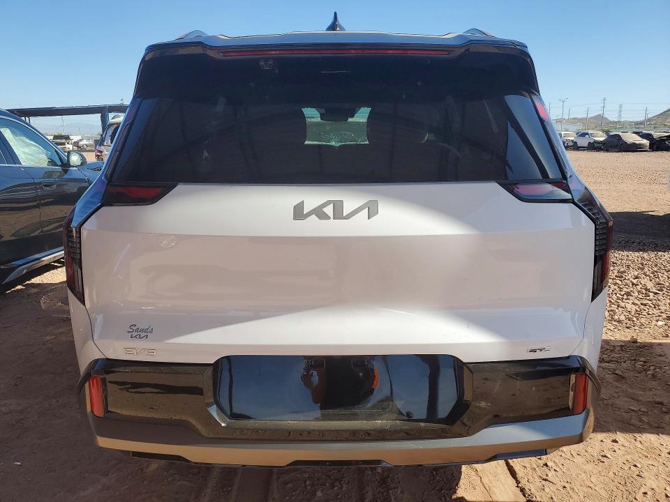 2026 Kia Ev9 VIN 5XYAEFS50TG018322 COPART salvage auction — FRONT END, AZ - CERT OF TITLE - SALVAGE, sold $15,900 on 2026-07-07 (photo 6)