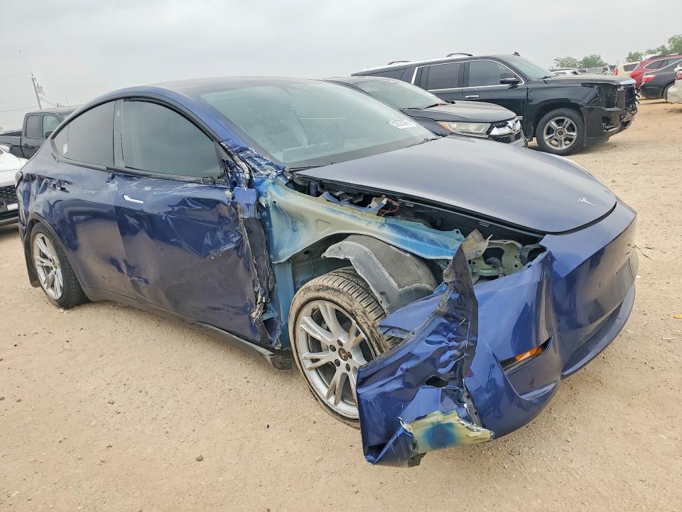 2023 Tesla Model y VIN 7SAYGAEE4PF700515 COPART salvage auction — ALL OVER, Tx - Salvage Vehicle Title, sold $3,350 on 2026-07-16 (photo 4)