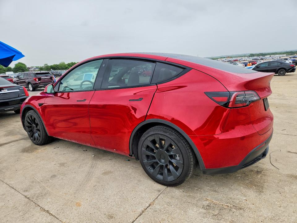 2021 Tesla Model y VIN 5YJYGDEE6MF230773 COPART salvage auction — SIDE, Tx - Salvage Vehicle Title, sold $14,100 on 2026-07-20 (photo 2)