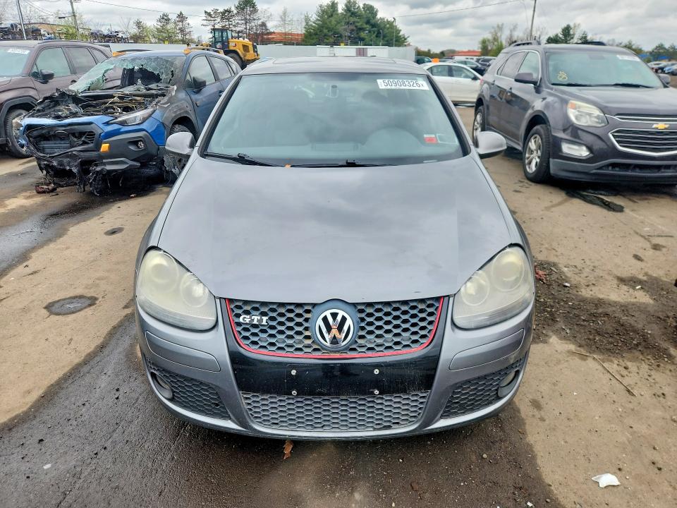 2009 Volkswagen Gti VIN WVWGV71K99W104117 COPART salvage auction — MINOR DENT/SCRATCHES, ME - CERTIFICATE OF TITLE, sold $1,150 on 2026-07-02 (photo 5)