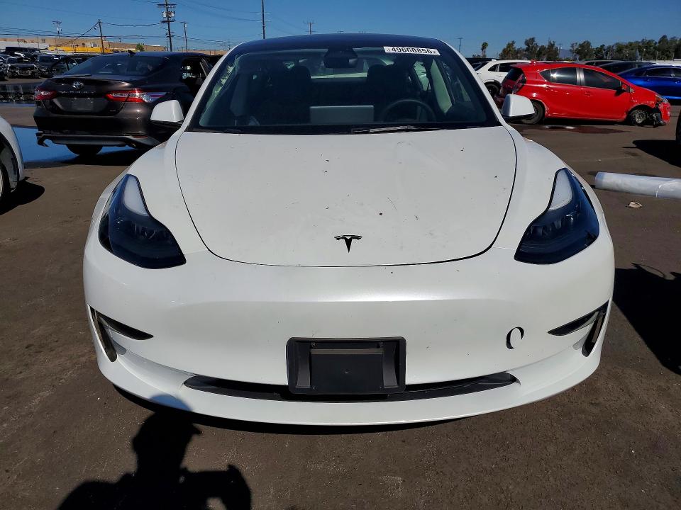 2023 Tesla Model 3 VIN 5YJ3E1EBXPF695517 COPART salvage auction — REAR END, Salvage Title, sold $9,200 on 2026-07-15 (photo 5)