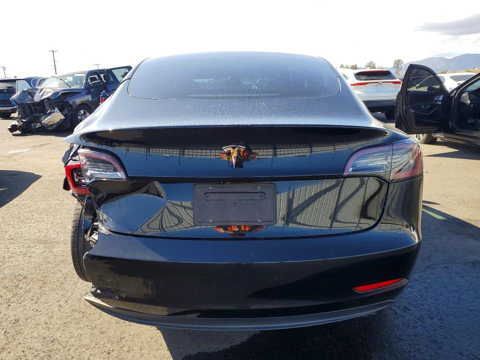 2023 Tesla Model 3 VIN 5YJ3E1EA8PF562228 COPART salvage auction — REAR END, Ca - Salvage Certificate, sold $6,000 on 2026-07-06 (photo 6)