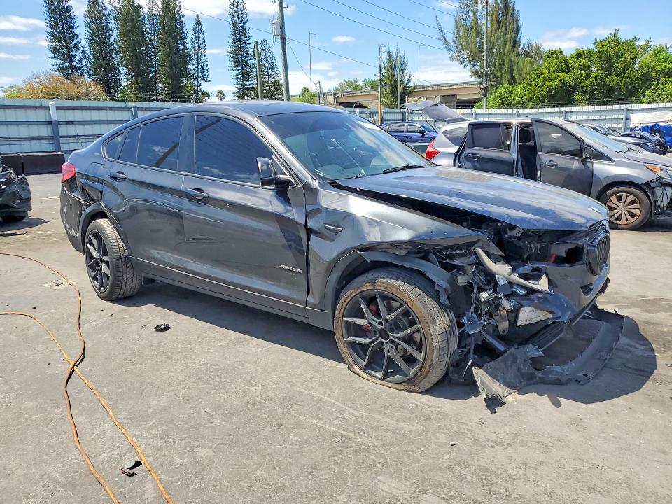 2015 BMW X4 VIN 5UXXW3C53F0M87482 COPART salvage auction — FRONT END, Fl - Cert Of Title Slvg Rebuildable, sold $10 on 2026-07-29 (photo 4)