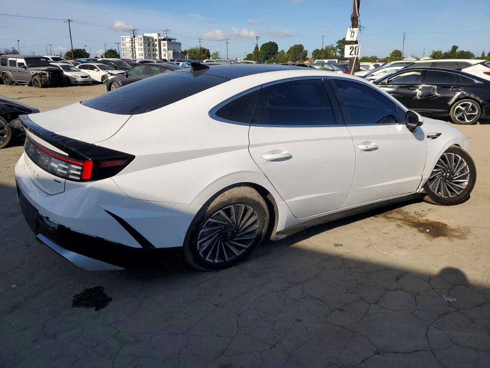 2026 Hyundai Sonata VIN KMHL34JJ5TA139957 COPART salvage auction — SIDE, Salvage Title, sold $6,600 on 2026-07-23 (photo 3)