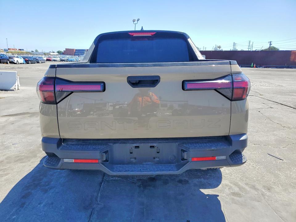 2023 Hyundai Santa cruz VIN 5NTJA4AE5PH048885 COPART salvage auction — SIDE, Salvage Title, sold $6,400 on 2026-07-15 (photo 6)