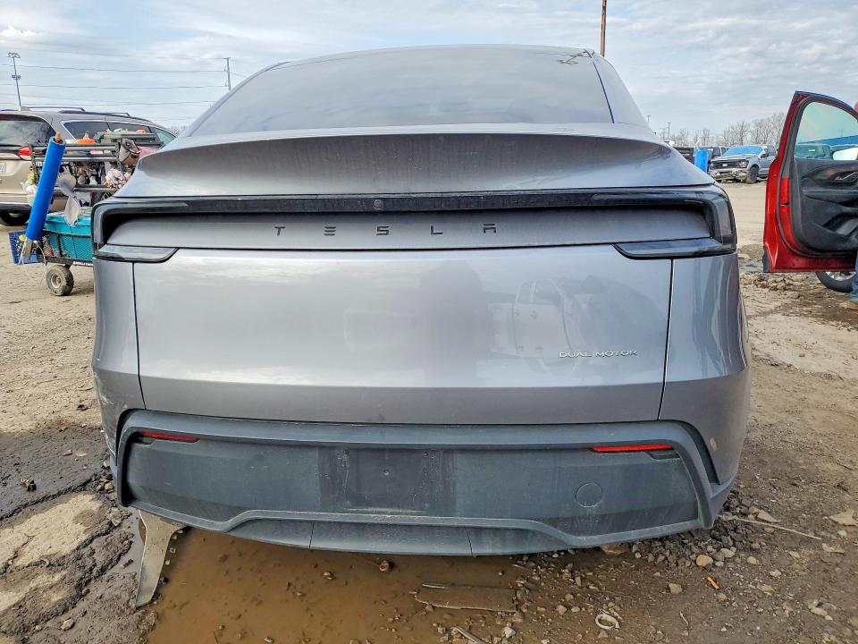 2026 Tesla Model y VIN 7SAYGDEE2TF425111 COPART salvage auction — SIDE, MI - CERT OF TITLE-SALVAGE VEHICLE, sold $19,200 on 2026-07-07 (photo 6)