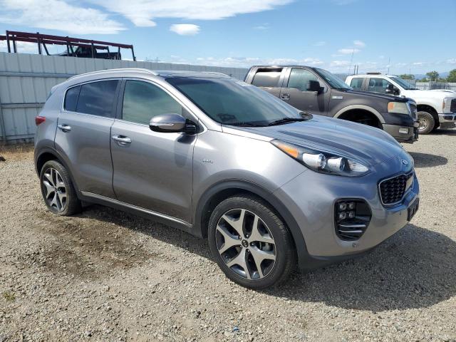 2017 Kia Sportage VIN KNDPRCA60H7104323 COPART salvage auction — INTERIOR BURN, Ca - Salvage Certificate, sold $1,400 on 2026-07-24 (photo 4)