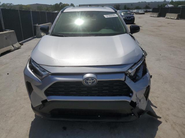 2023 Toyota Rav4 VIN JTMRWRFV2PD189265 COPART salvage auction — SIDE, Salvage Title, sold $11,000 on 2026-07-14 (photo 5)