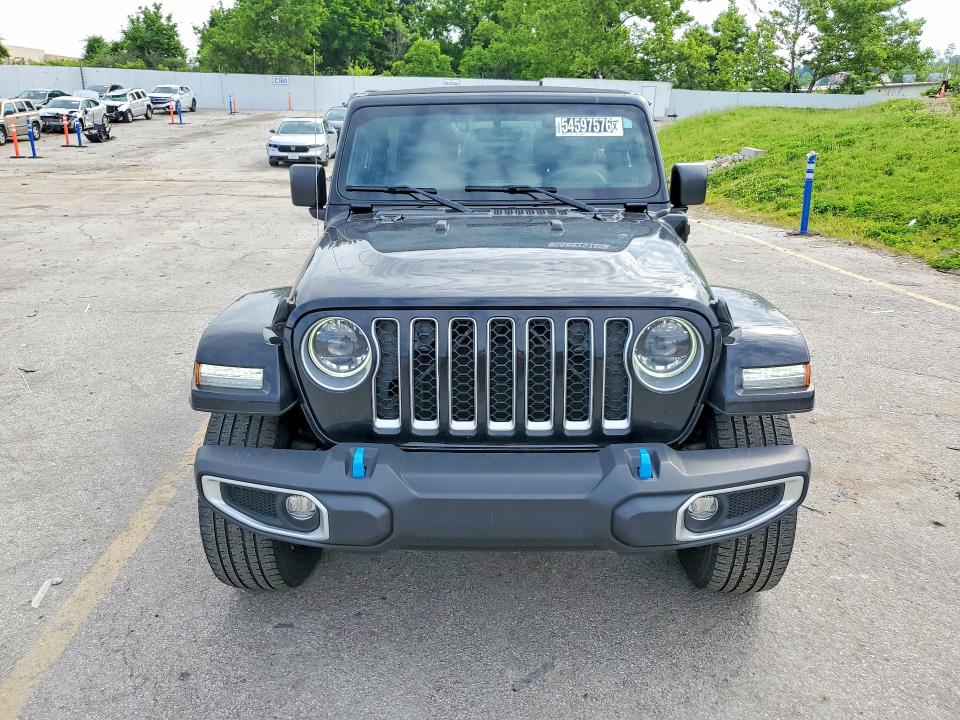 2023 Jeep Wrangler / VIN 1C4JJXP64PW513537 COPART salvage auction — MINOR DENT/SCRATCHES, Mo - Certificate Of Title, sold $21,000 on 2026-07-02 (photo 5)
