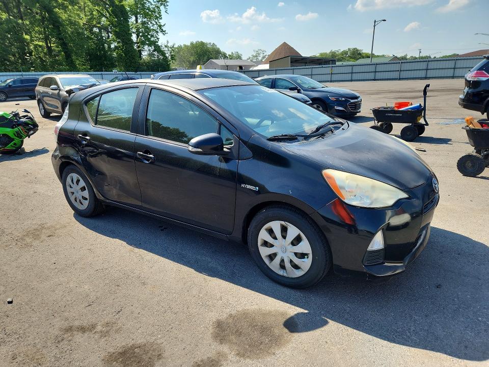 2012 Toyota Prius VIN JTDKDTB35C1019700 COPART salvage auction — SIDE, Id - Salvage Certificate Of Title, sold $150 on 2026-07-21 (photo 4)