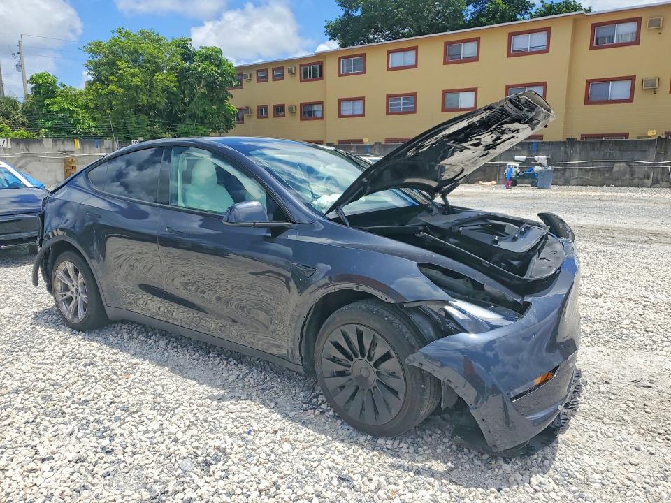 2024 Tesla VIN 7SAYGDED1RF034256 COPART salvage auction — REAR END, Fl - Cert Of Title Slvg Rebuildable, sold $6,000 on 2026-07-28 (photo 4)