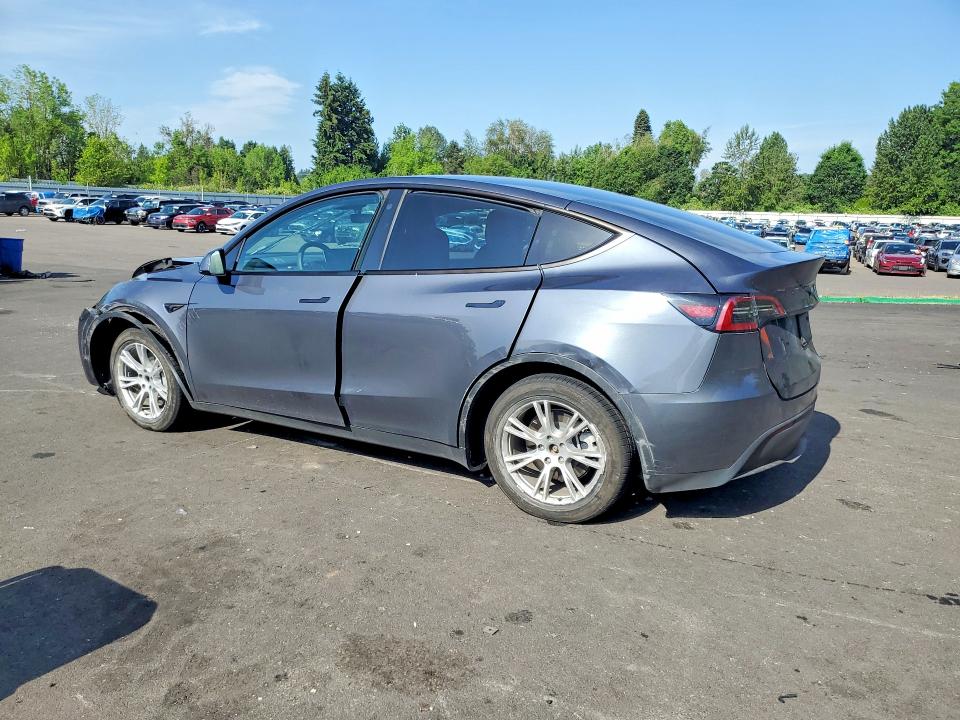 2023 Tesla Model y VIN 7SAYGDEE5PF645848 COPART salvage auction — SIDE, Or - Salvage Title Certificate, sold $6,400 on 2026-07-20 (photo 2)