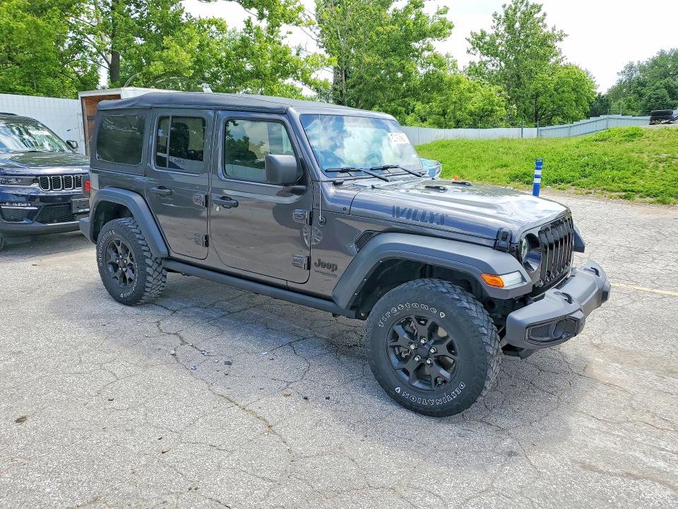 2021 Jeep Wrangler unlimited VIN 1C4HJXDN5MW817014 COPART salvage auction — MINOR DENT/SCRATCHES, MO - CERTIFICATE OF TITLE, sold $19,800 on 2026-07-16 (photo 4)