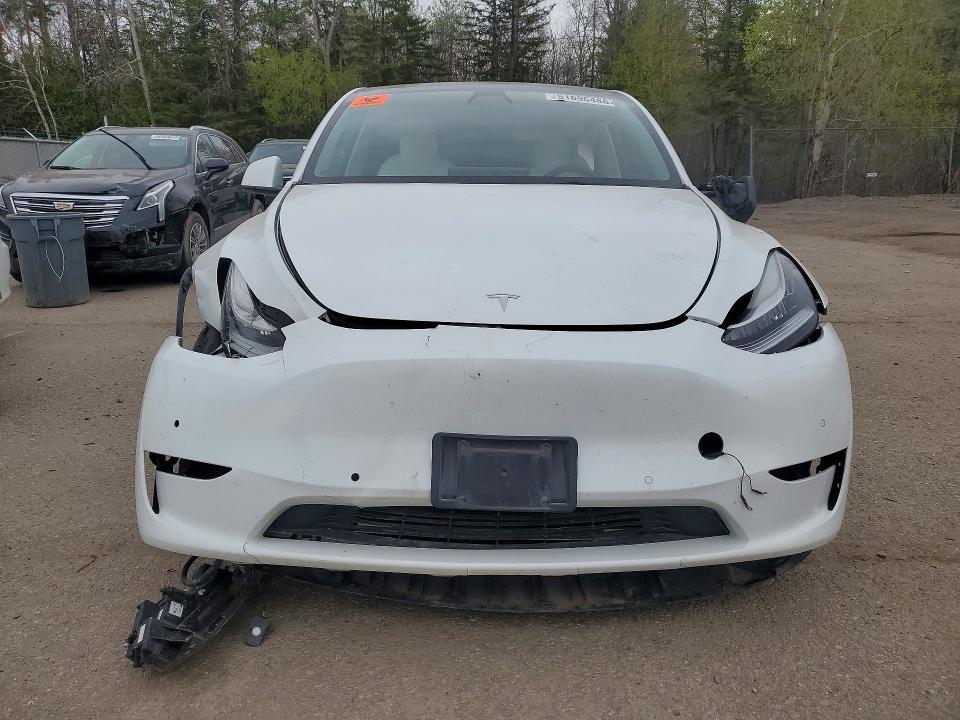 2022 Tesla Model y VIN 7SAYGDEE8NF361840 COPART salvage auction — SIDE, On - Permit Salvage, sold $5,700 on 2026-07-07 (photo 5)
