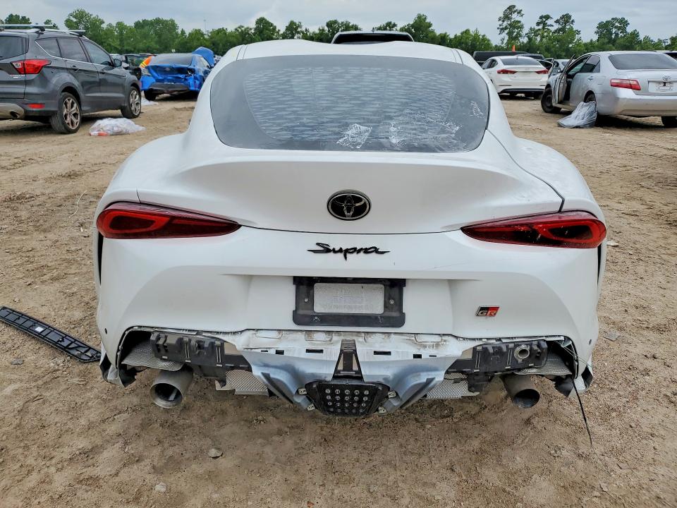 2022 Toyota Supra VIN WZ1DB0C01NW049558 COPART salvage auction — SIDE, Tx - Salvage Vehicle Title, sold $11,200 on 2026-07-28 (photo 6)