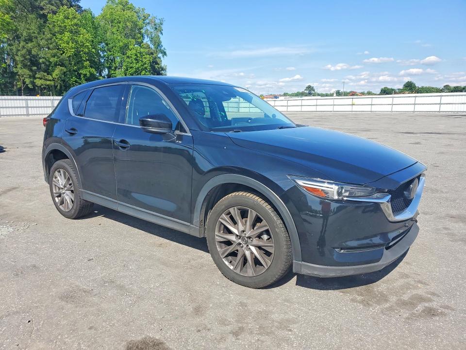 2021 Mazda VIN JM3KFBDM8M0320308 COPART salvage auction — SIDE, Nc - Salvage Certificate Of Title, sold $8,300 on 2026-07-09 (photo 4)