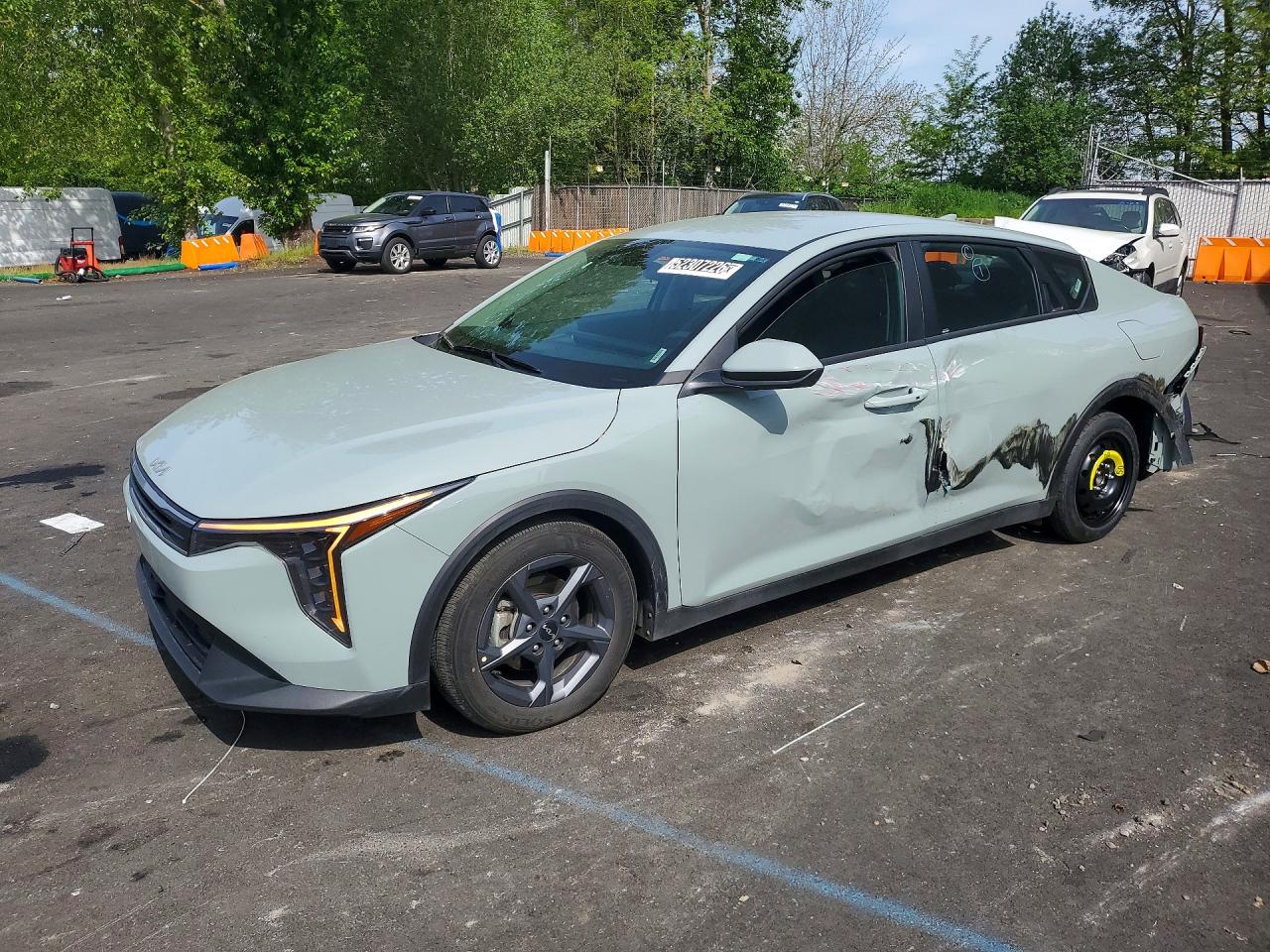 2025 Kia K4 VIN 3KPFT4DE6SE068442 COPART salvage auction — Side, OR - SALVAGE TITLE CERTIFICATE, sold $6,000 on 2026-06-24 (photo 1)