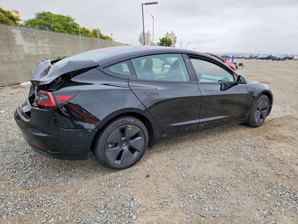2023 Tesla Model 3 VIN 5YJ3E1EA7PF665818 COPART salvage auction — REAR END, Ca - Salvage Certificate, sold $6,100 on 2026-10-02 (photo 5)