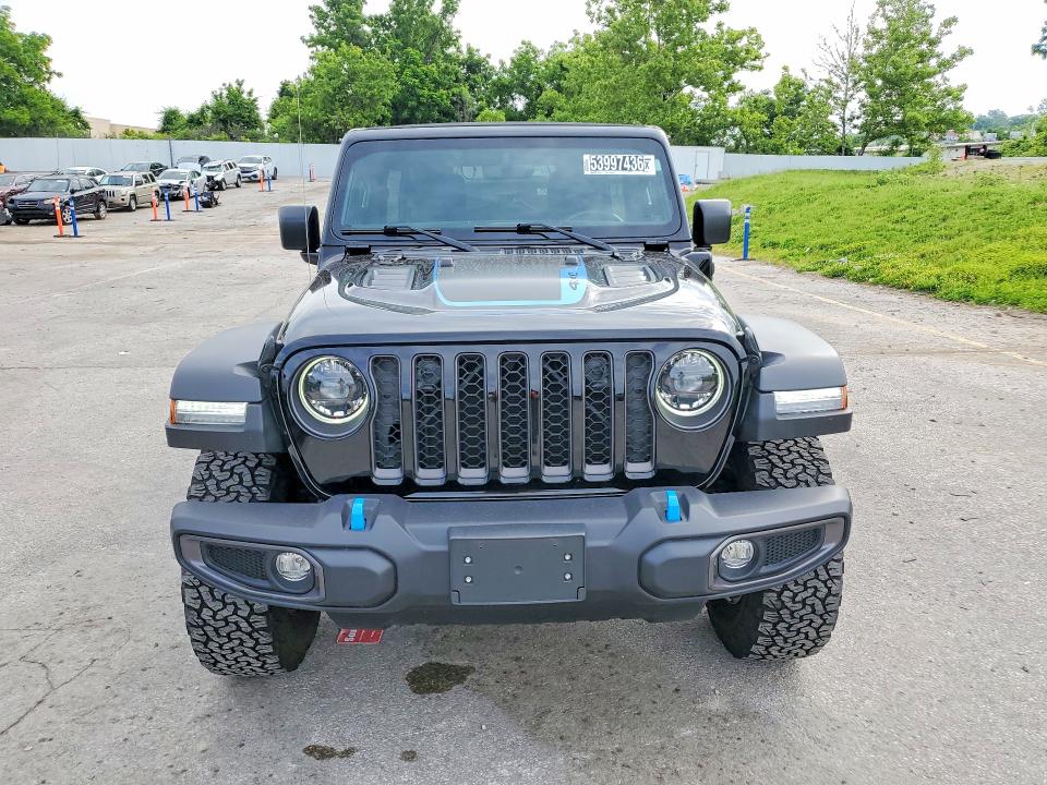 2023 Jeep Wrangler / VIN 1C4JJXR67PW518535 COPART salvage auction — MINOR DENT/SCRATCHES, Mo - Certificate Of Title, sold $24,250 on 2026-07-02 (photo 5)