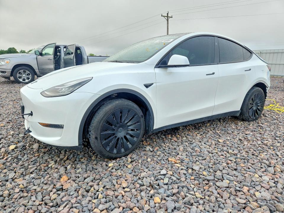 2023 Tesla Model y VIN 7SAYGDEE7PA141234 COPART salvage auction — REAR END, Mo - Salvage Certificate Of Title, sold $14,500 on 2026-07-27 (photo 1)