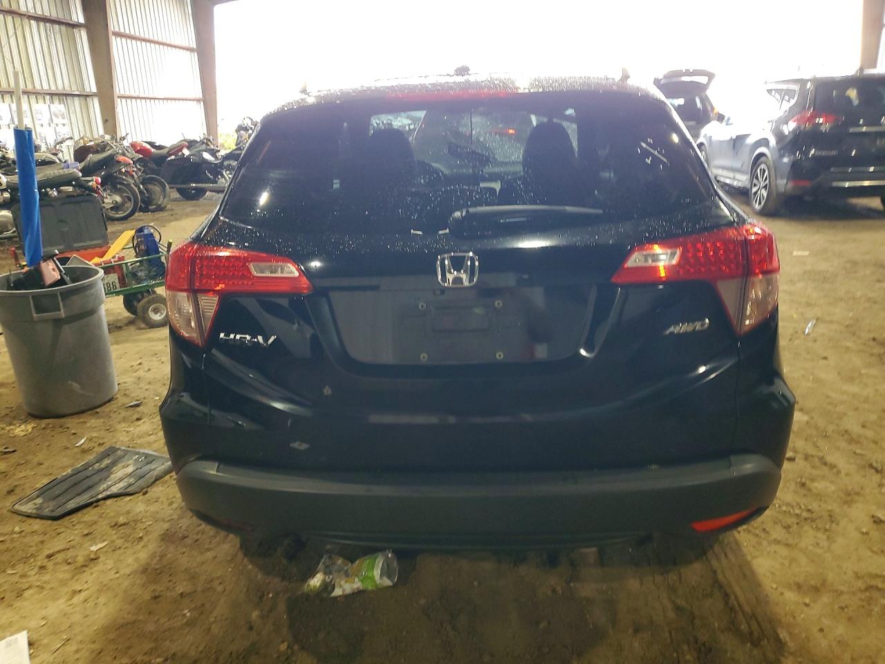 2016 Honda HR-V VIN 3CZRU6H70GM767283 COPART salvage auction — Water/Flood, TX - SALVAGE TITLE-FLOOD DAMAGE, sold $2,800 on 2026-06-29 (photo 6)