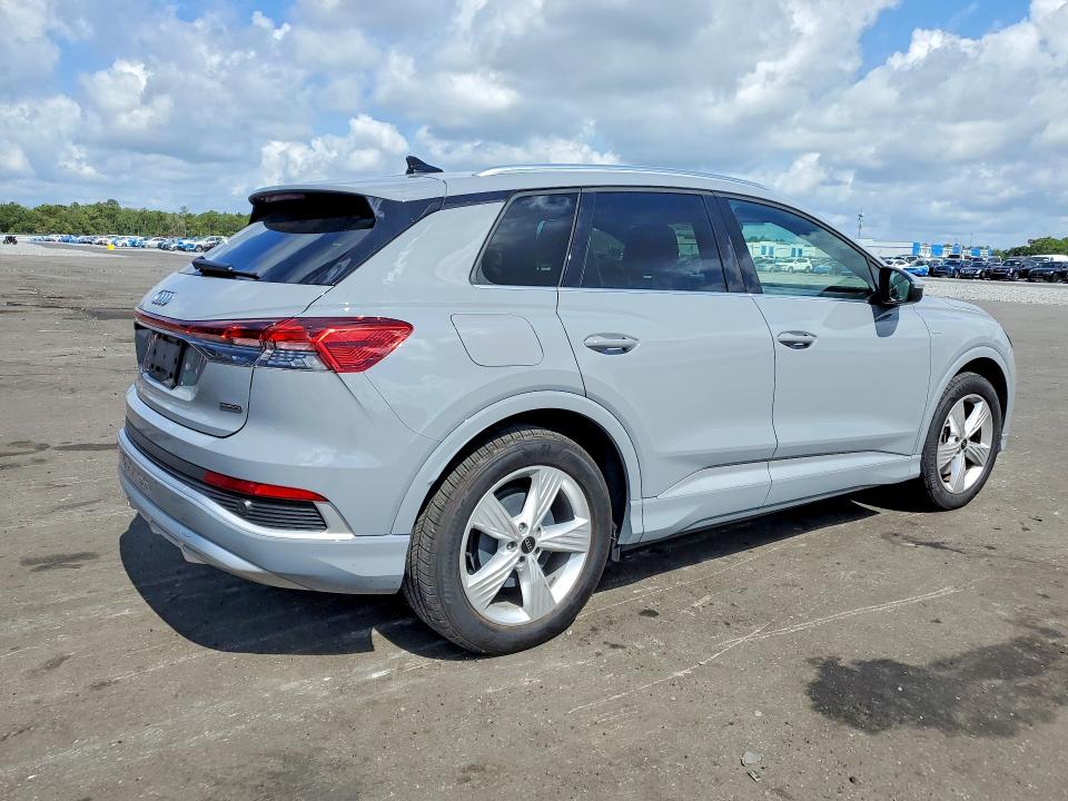 2024 Audi Q4 e-tron VIN WA1KUBFZ3RP053790 COPART salvage auction — SIDE, Fl - Cert Of Title Slvg Rebuildable, sold $17,900 on 2026-07-08 (photo 3)