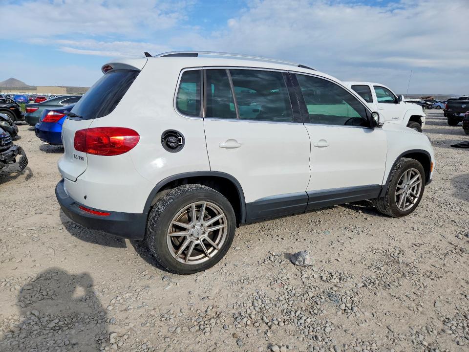 2013 Volkswagen Tiguan VIN WVGAV3AXXDW560464 COPART salvage auction — MINOR DENT/SCRATCHES, Mt - Certificate Of Title, sold $350 on 2026-07-31 (photo 3)