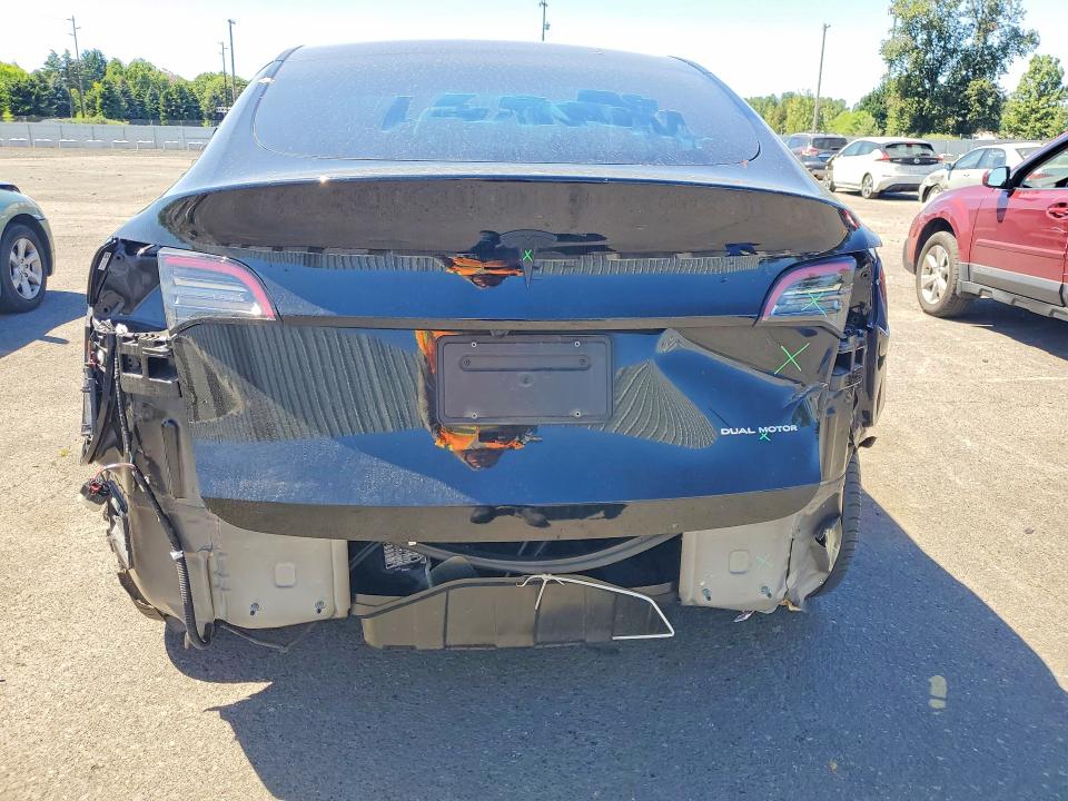 2024 Tesla Model y VIN 7SAYGDEEXRF129701 COPART salvage auction — REAR END, Id - Salvage Certificate Of Title, sold $13,600 on 2026-07-29 (photo 6)