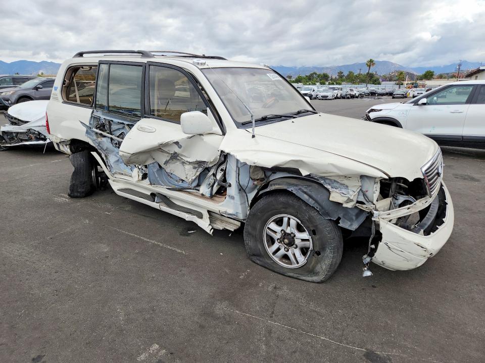 2000 Lexus Lx VIN JT6HT00W4Y0120384 COPART salvage auction — ALL OVER, Ca - Salvage Certificate, sold $925 on 2026-07-13 (photo 4)