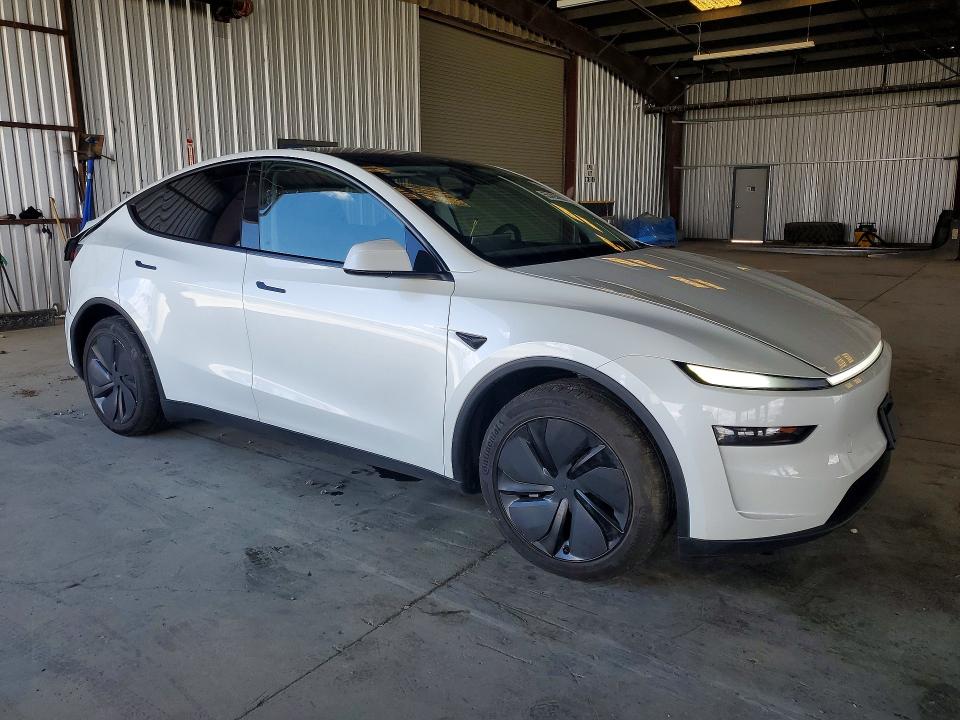 2026 Tesla Model y VIN 7SAYGDEE5TF349139 COPART salvage auction — REAR END, Salvage Title, sold $23,700 on 2026-07-21 (photo 4)