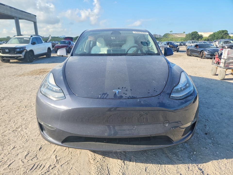2023 Tesla VIN 7SAYGDEE5PA161434 COPART salvage auction — SIDE, FL - CERT OF TITLE SLVG REBUILDABLE, sold $9,700 on 2026-07-02 (photo 5)