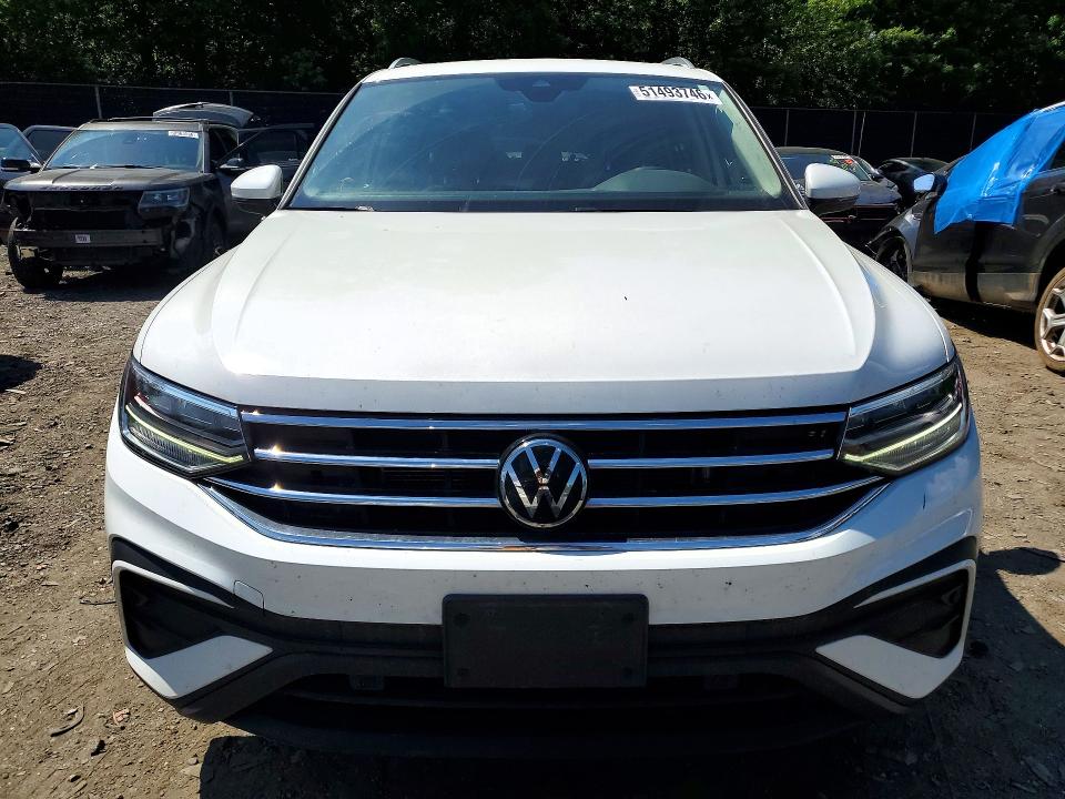 2023 Volkswagen Tiguan VIN 3VVNB7AX3PM009675 COPART salvage auction — REAR END, Id - Salvage Certificate Of Title, sold $8,700 on 2026-08-28 (photo 5)