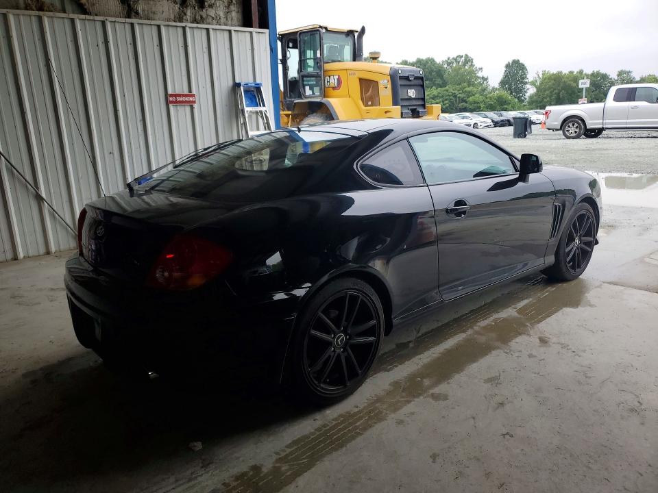 2004 Hyundai Tiburon VIN KMHHM65D04U107498 COPART salvage auction — SIDE, Nc - Salvage Certificate Of Title, sold $200 on 2026-07-08 (photo 3)