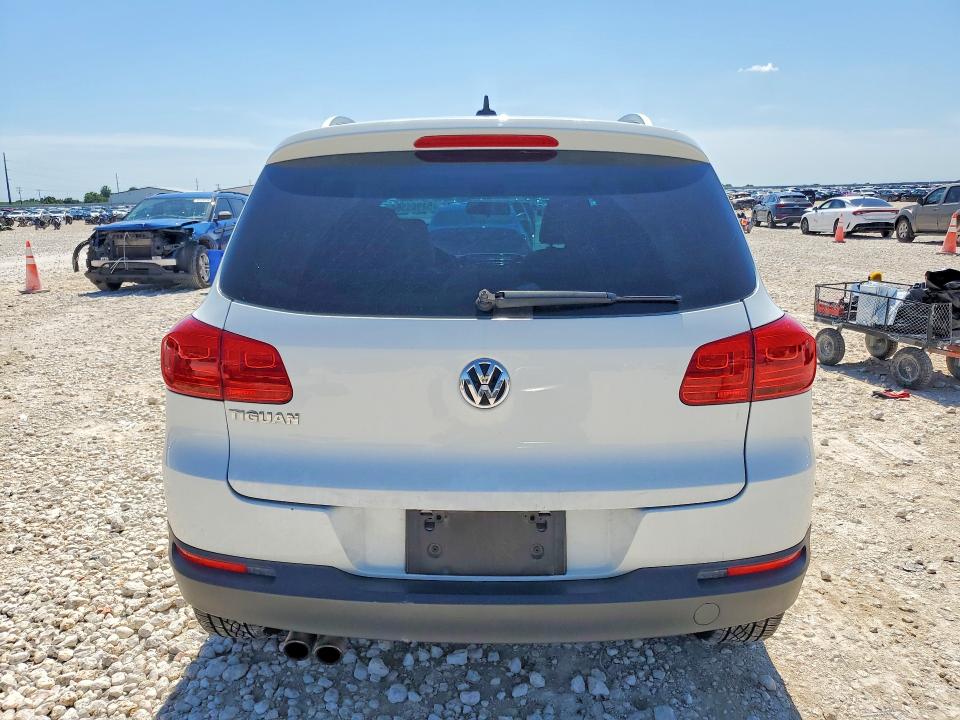 2015 Volkswagen Tiguan VIN WVGAV7AX8FW604603 COPART salvage auction — NORMAL WEAR, Tx - Salvage Vehicle Title, sold $150 on 2026-08-13 (photo 6)