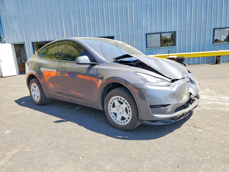 2023 Tesla Model y VIN 7SAYGAEE0PF589025 COPART salvage auction — FRONT END, Or - Salvage Title Certificate, sold $500 on 2026-07-29 (photo 4)
