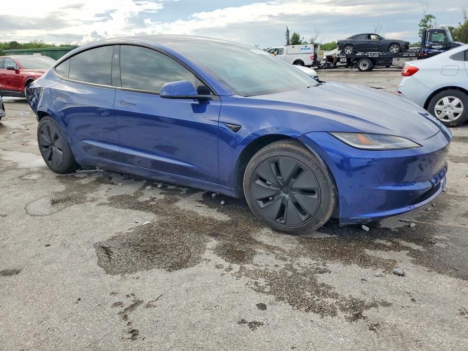 2025 Tesla Model 3 VIN 5YJ3E1EA8SF951735 COPART salvage auction — REAR END, Fl - Cert Of Title Slvg Rebuildable, sold $8,100 on 2026-07-28 (photo 4)