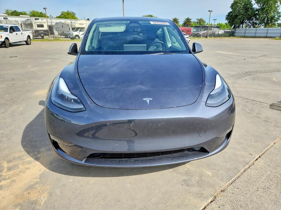 2022 Tesla Model y VIN 7SAYGDEE9NF569774 COPART salvage auction — REAR END, CA - SALVAGE CERTIFICATE, sold $11,400 on 2026-07-06 (photo 5)