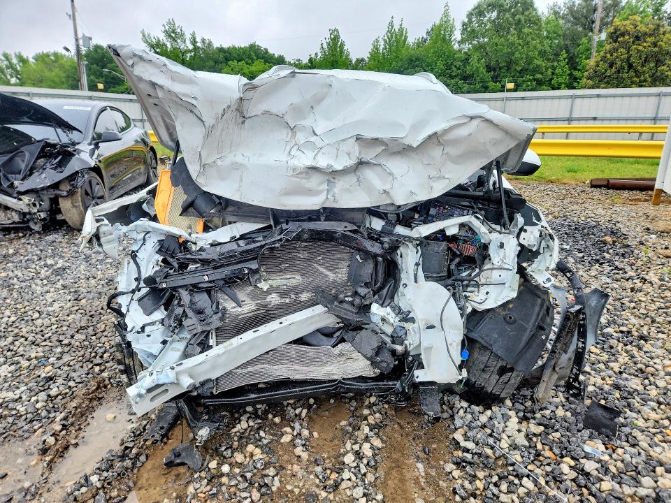 2023 Buick Envision VIN LRBFZNR40PD026957 COPART salvage auction — FRONT END, Tn - Salvage Certificate, sold $525 on 2026-07-02 (photo 5)