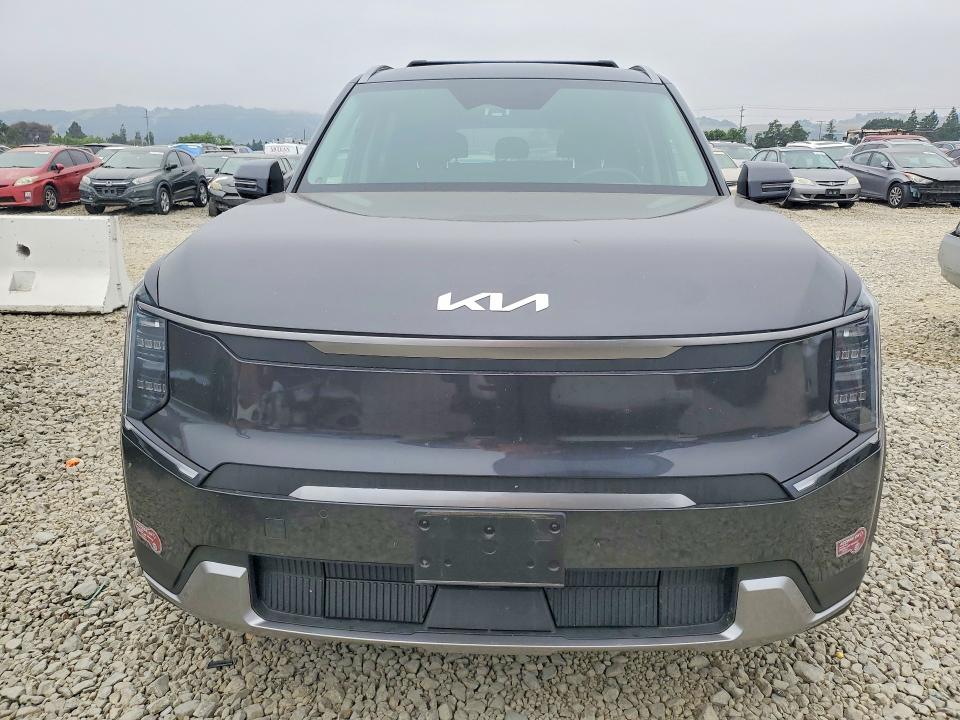 2024 Kia Ev9 VIN KNDAFFS59R6046273 COPART salvage auction — SIDE, CA - SALVAGE CERTIFICATE, sold $22,200 on 2026-09-22 (photo 5)