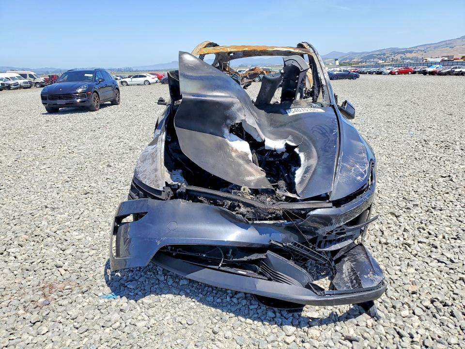 2026 Tesla Model y VIN 7SAYGDEE5TF341283 COPART salvage auction — BURN, Ca - Non-Repairable Vehicle Cert, sold $10 on 2026-07-16 (photo 5)