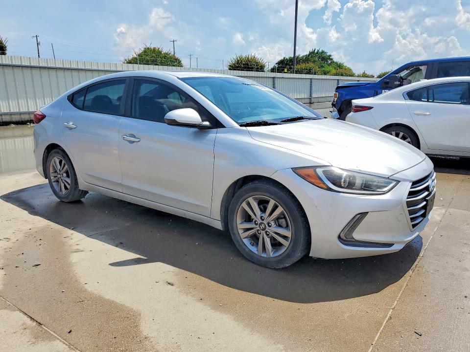 2018 Hyundai Elantra VIN KMHD84LF4JU586161 COPART salvage auction — SIDE, Tx - Salvage Vehicle Title, sold $4,750 on 2026-07-23 (photo 4)