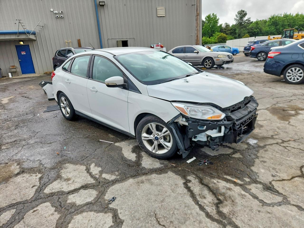 2014 Ford Focus VIN 1FADP3F22EL172999 COPART salvage auction — Front End, TN - SALVAGE CERTIFICATE, sold $800 on 2026-07-09 (photo 4)