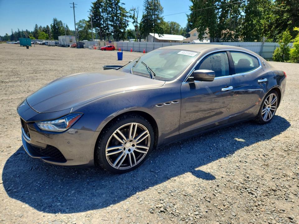 2014 Maserati Ghibli VIN ZAM57RTA7E1113595 COPART salvage auction — MECHANICAL, WA - CERT OF OWNERSHIP-REBUILT, sold $350 on 2026-08-07 (photo 1)