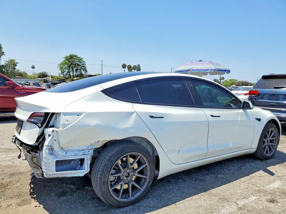 2023 Tesla Model 3 VIN 5YJ3E1EA2PF587769 COPART salvage auction — REAR END, CA - SALVAGE CERTIFICATE, sold $9,500 on 2026-07-28 (photo 3)